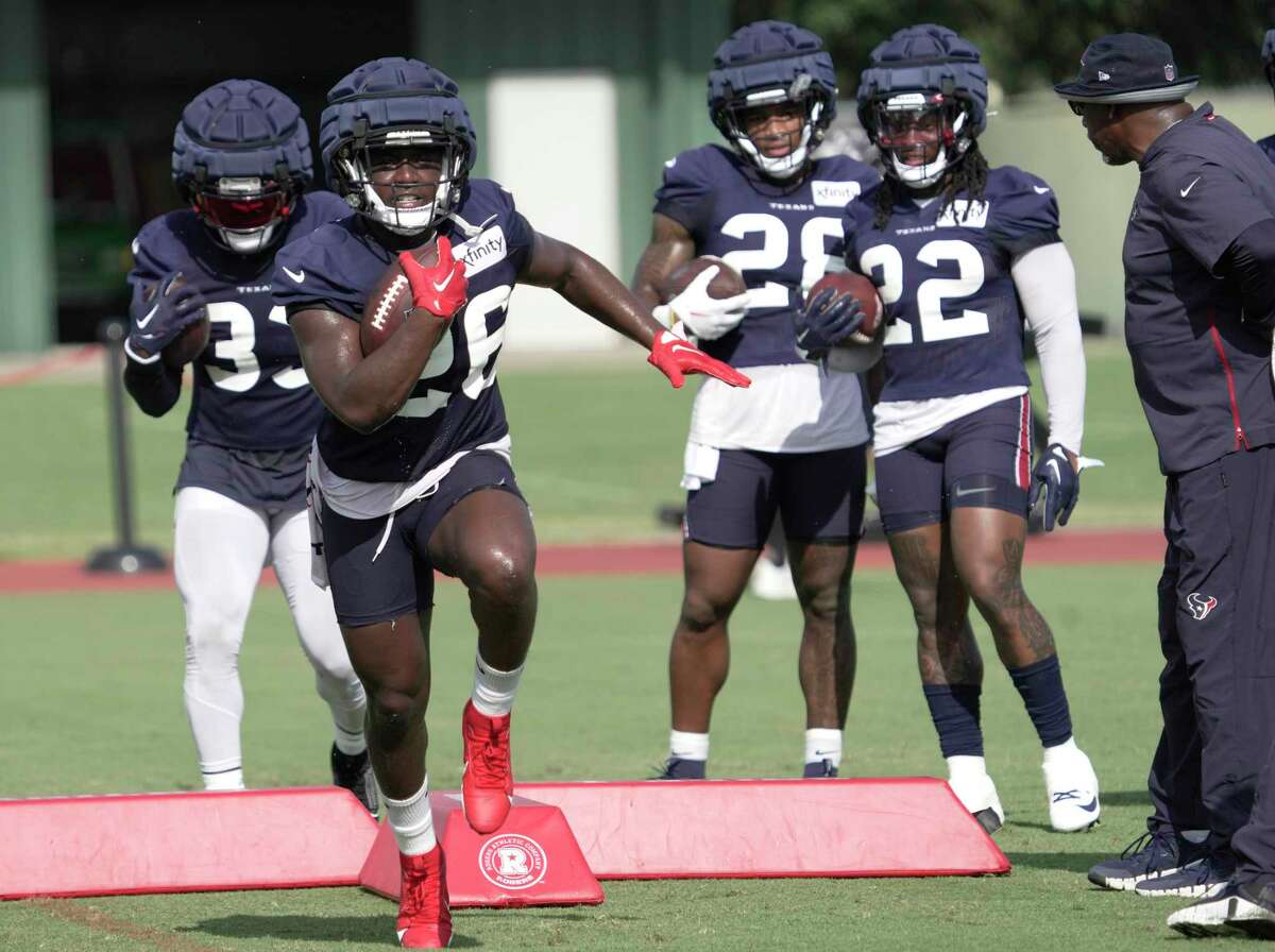 Cowboys training camp photos: Dalton Schultz father-son time and more from  Thursday's practice