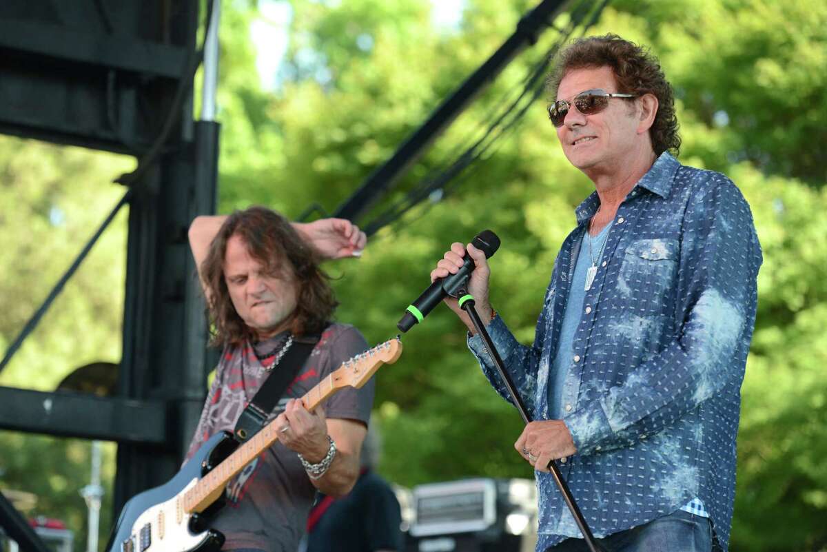 Guitarist John Roth and singer Mickey Thomas perform with Starship on May 23, 2015, in Bakersfield.