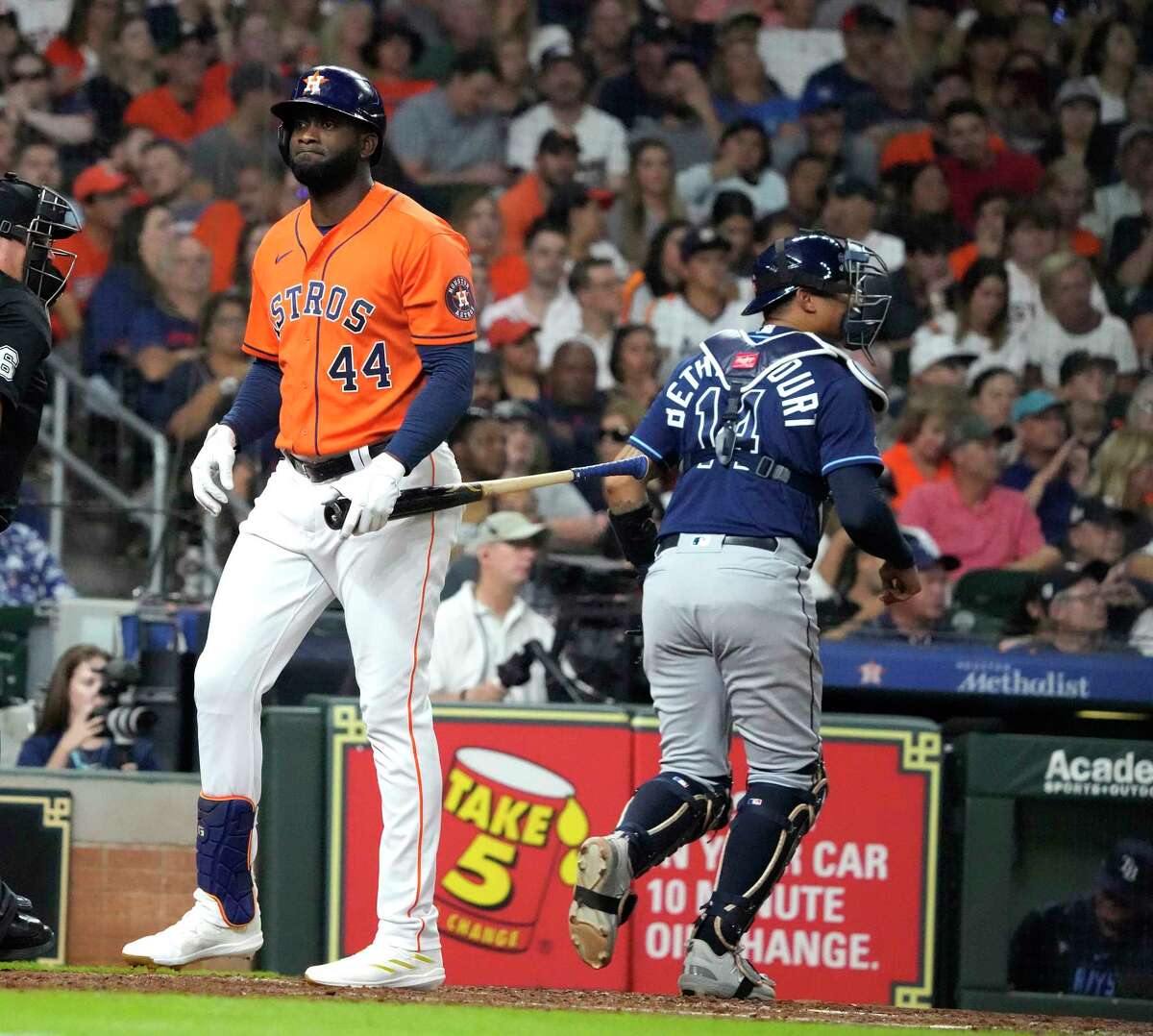 Houston Astros second baseman Jose Altuve (27) and shortstop Carlos Correa  laugh at the end of their 4-3 victory over the Oakland Athletics in a  baseball game, Wednesday, Aug. 31, 2016, in