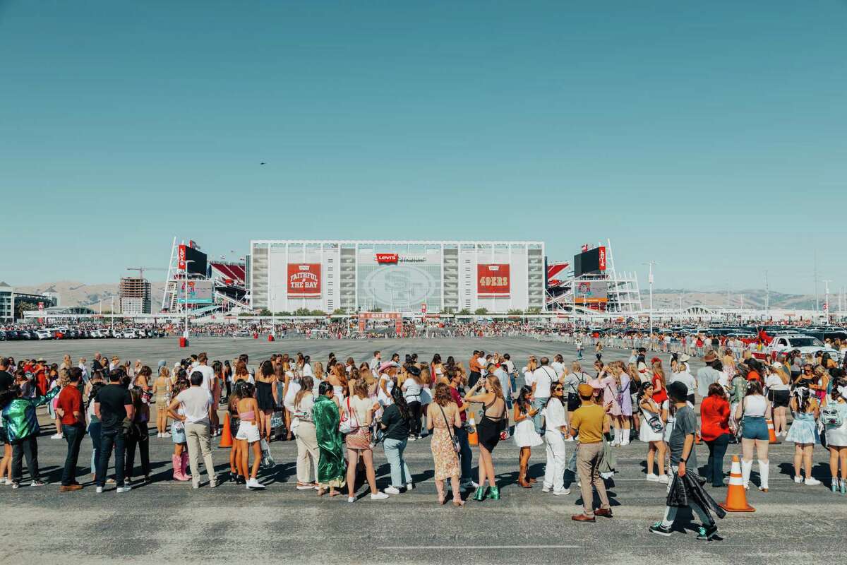 A crowd waits in line to enter Levi’s Stadium in Santa Clara for Taylor Swift’s Eras Tour on Friday, July 28.