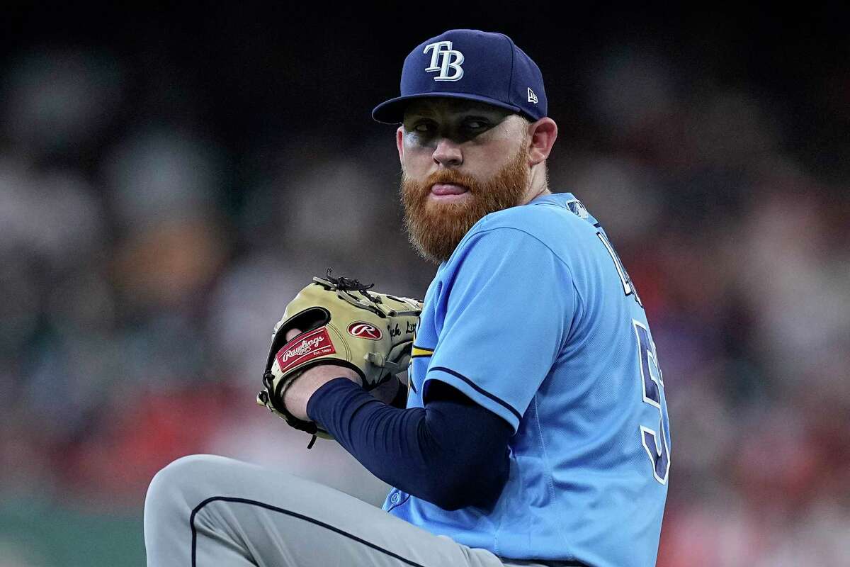 Josh Lowe of the Tampa Bay Rays stands on first base next to his News  Photo - Getty Images