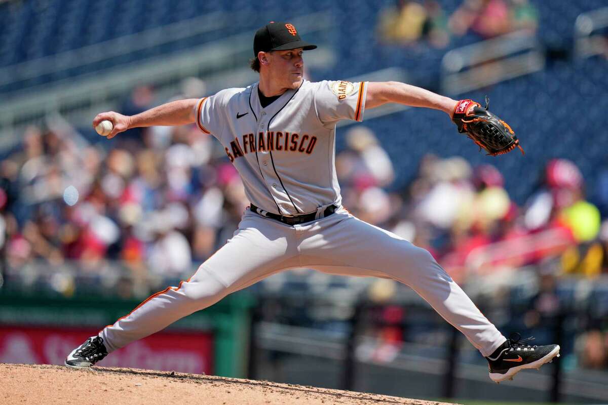 Anthony DeSclafani of the San Francisco Giants is taken out of the