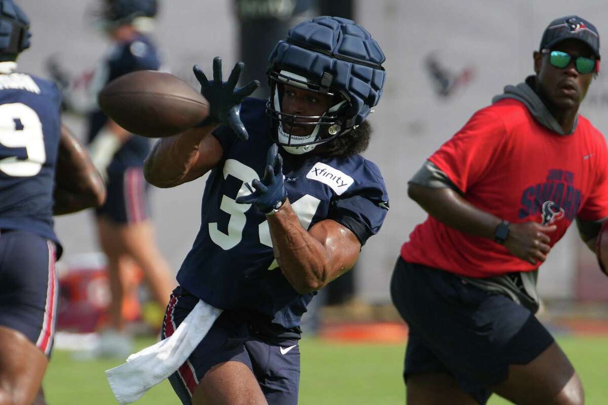 Houston Texans defensive tackle Thomas Booker IV (56) warms up before  taking on the New York