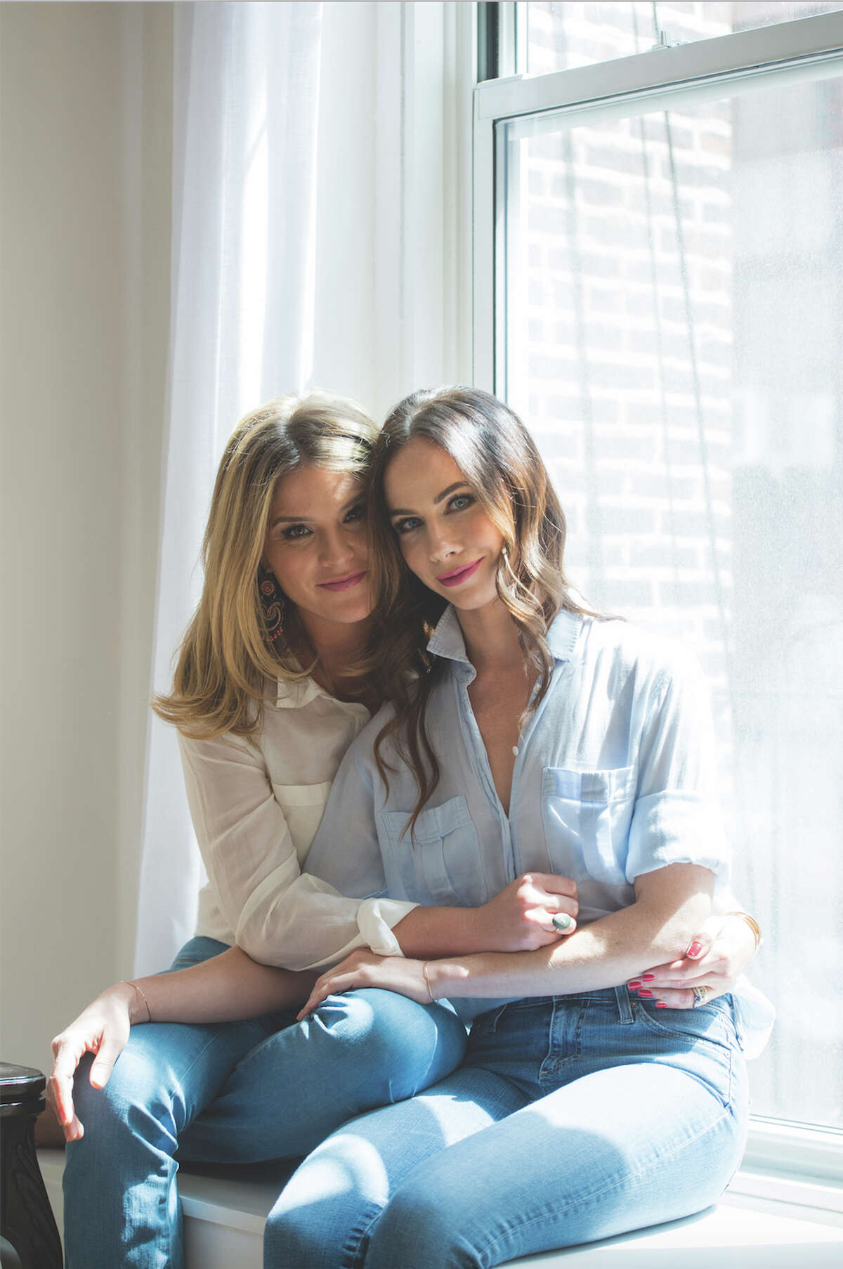 Bush daughters visit Houston on book tour for 'Love Comes First'