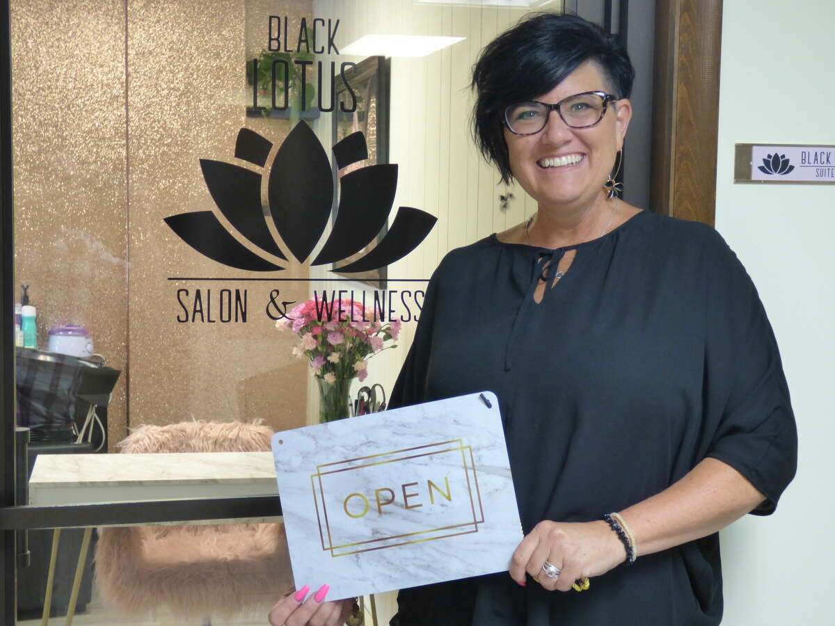 Tristann Carroll welcomes clients to Black Lotus Salon & Wellness in downtown Manistee. The salon opened for business July 21.