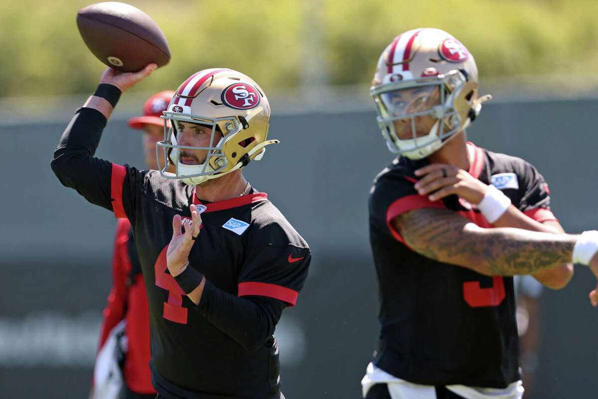 San Francisco 49ers quarterbacks Trey Lance (5) and Brock Purdy take part  in drills at the NFL football team's practice facility in Santa Clara,  Calif., Friday, Aug. 5, 2022. (AP Photo/Jeff Chiu