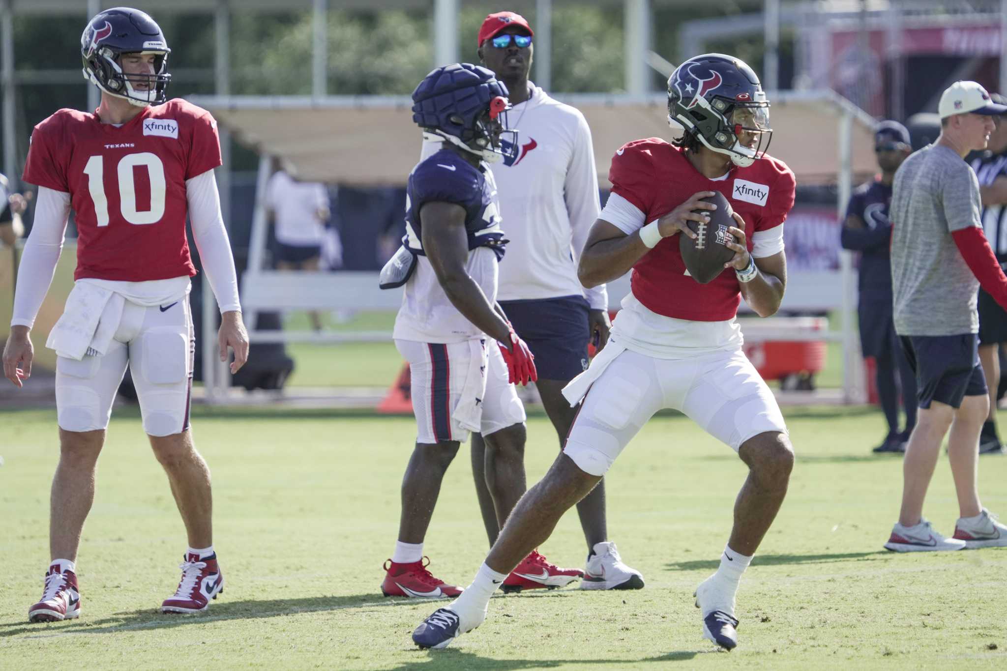 Houston Texans defensive end Troy Hairston (34) warms up against