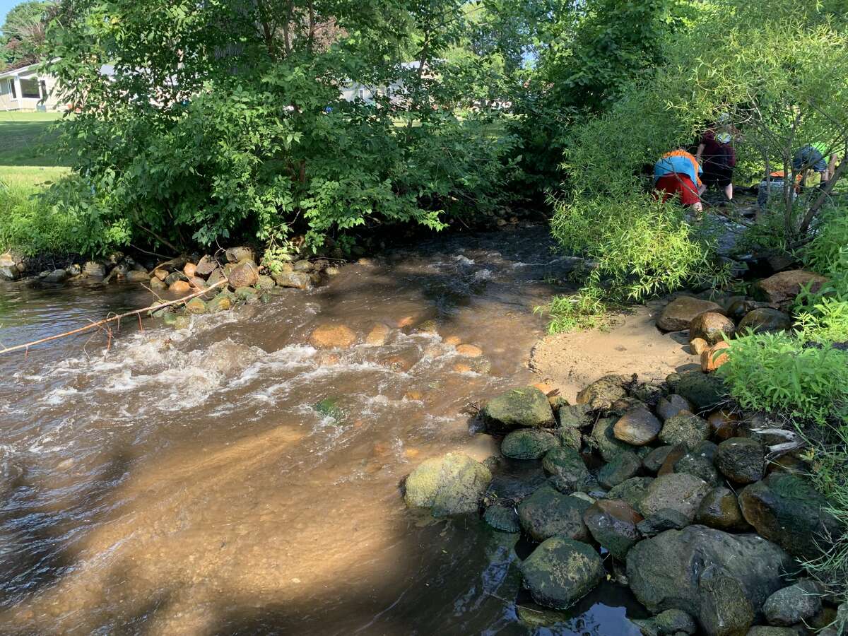 Crews remove 11 rock dams along Twin Creek in Evart