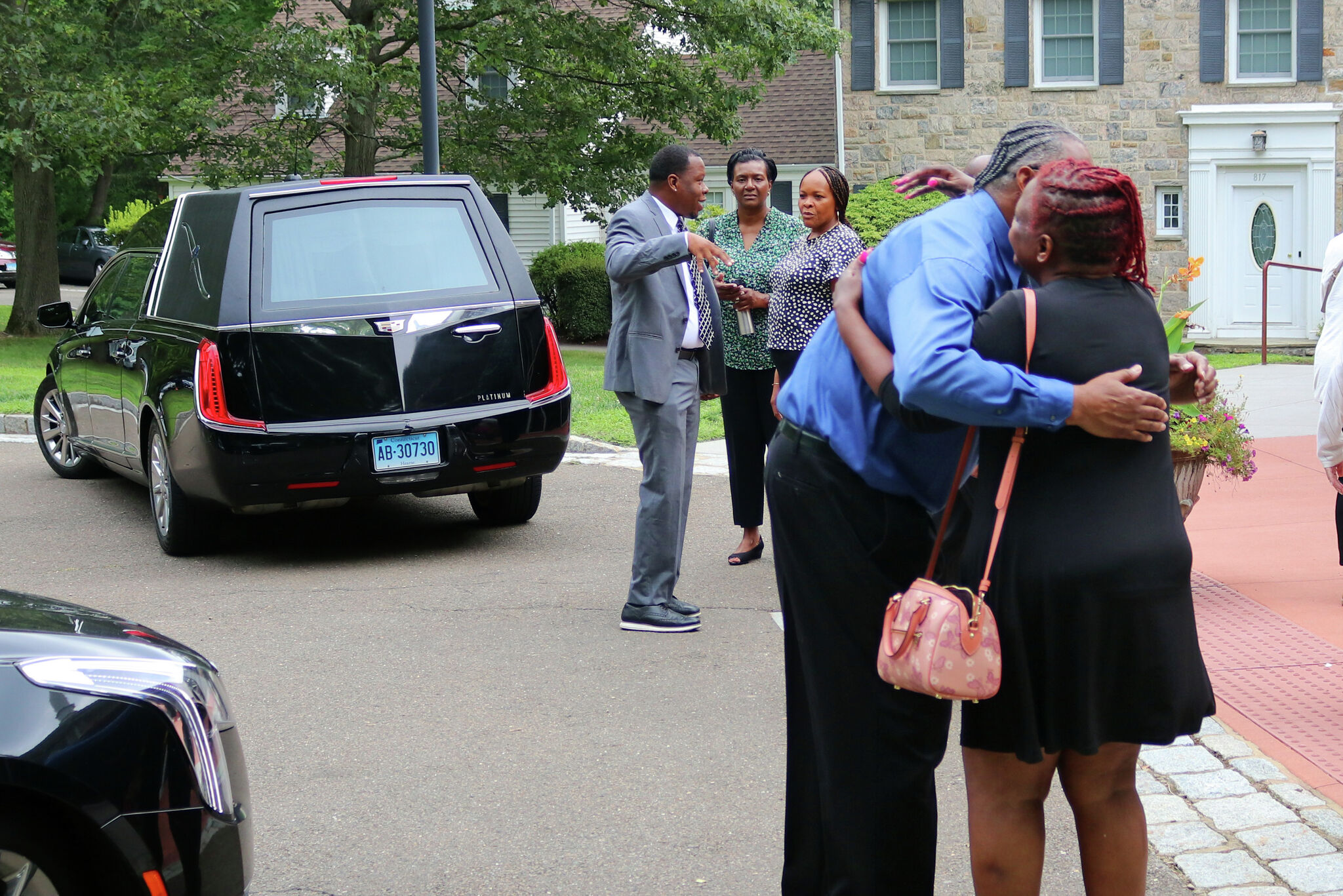 Stamford pastor's family, friends gather for his funeral