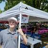 Griffin Miller at his canopy at the Saratoga Race Course Saturday, Aug. 5, 2023 in Saratoga Springs, N.Y. Photo Special to the Times Union by Skip Dickstein