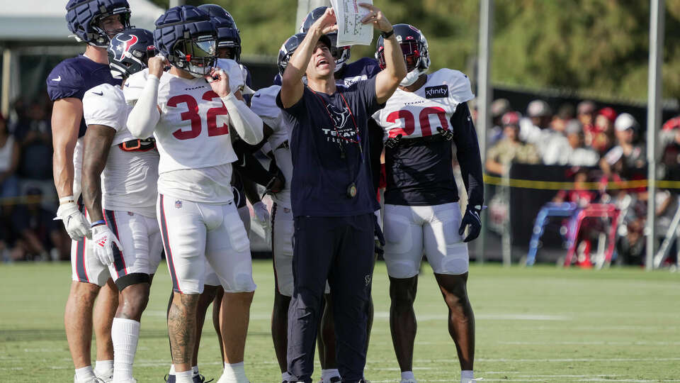 Houston Texans special teams coordinator Frank Ross calls a play during an NFL training camp Saturday, Aug. 5, 2023, in Houston.