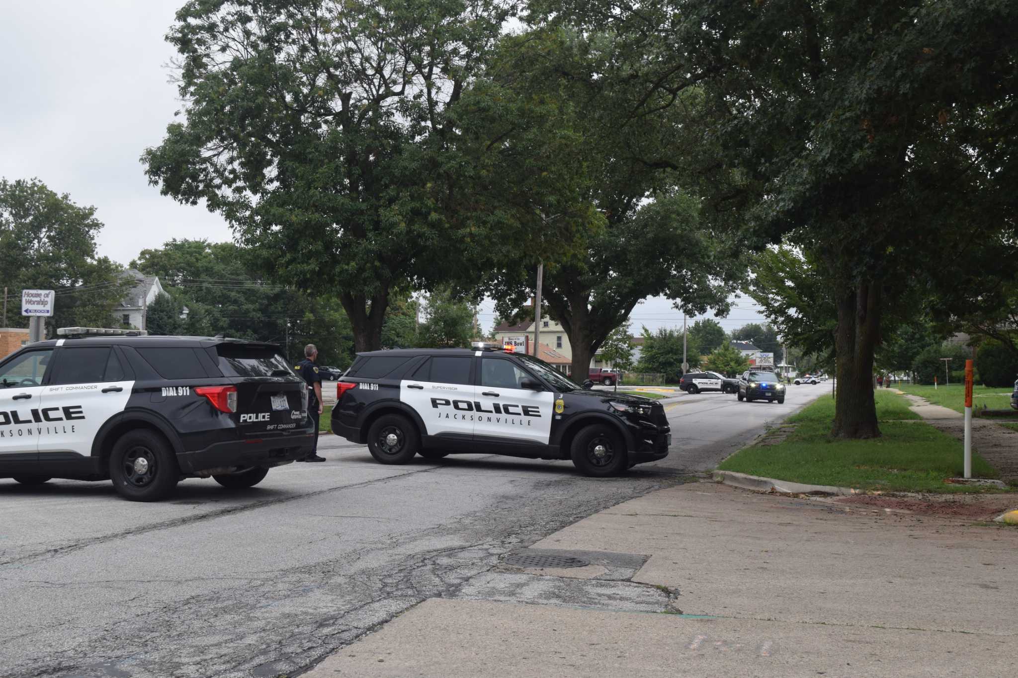 Business robbed; Jacksonville say standoff with suspect over