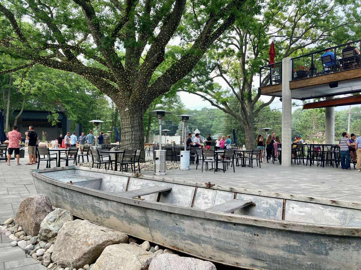 Customers gather in the Biergarten at Styx in Ludington. The bar/restaurant/bowling alley was purchased and rebuilt by ophthalmologist Andrew Riemer. 