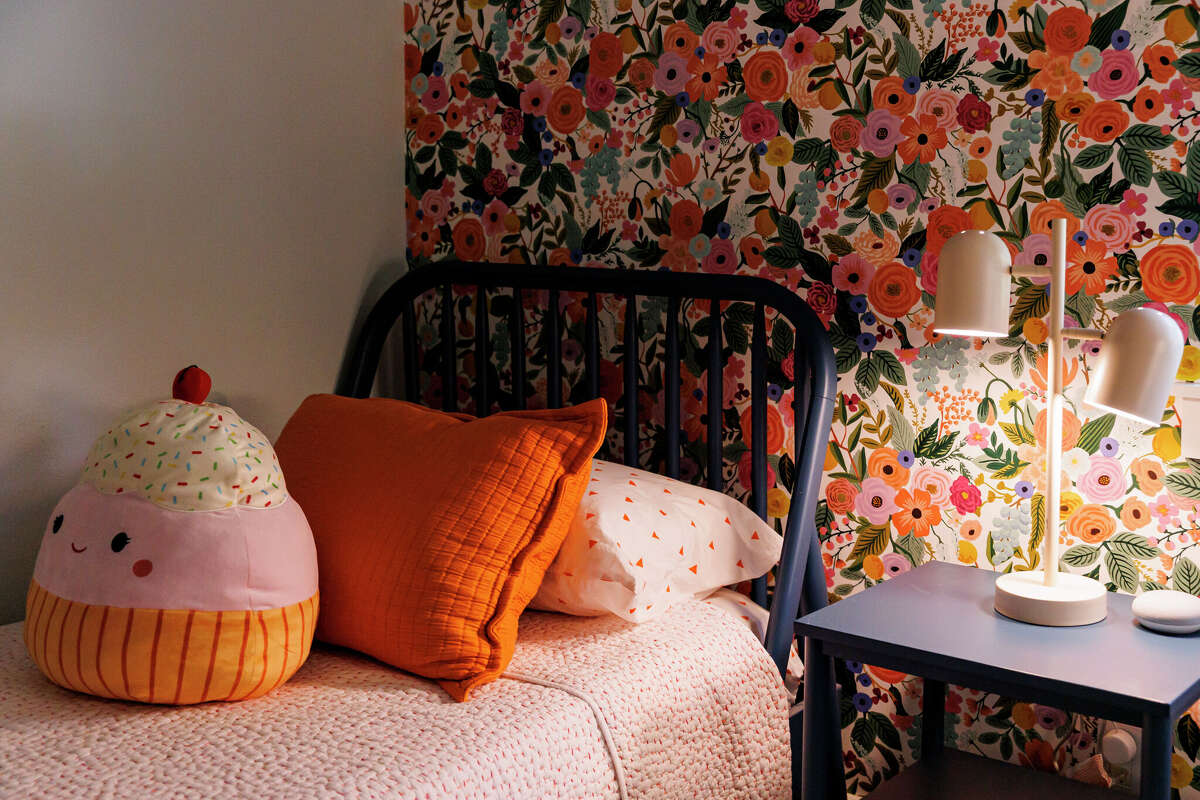 The girls' bedrooms were designed to stand the test of time, so they can work both with toys and childlike things, while also feeling sophisticated.