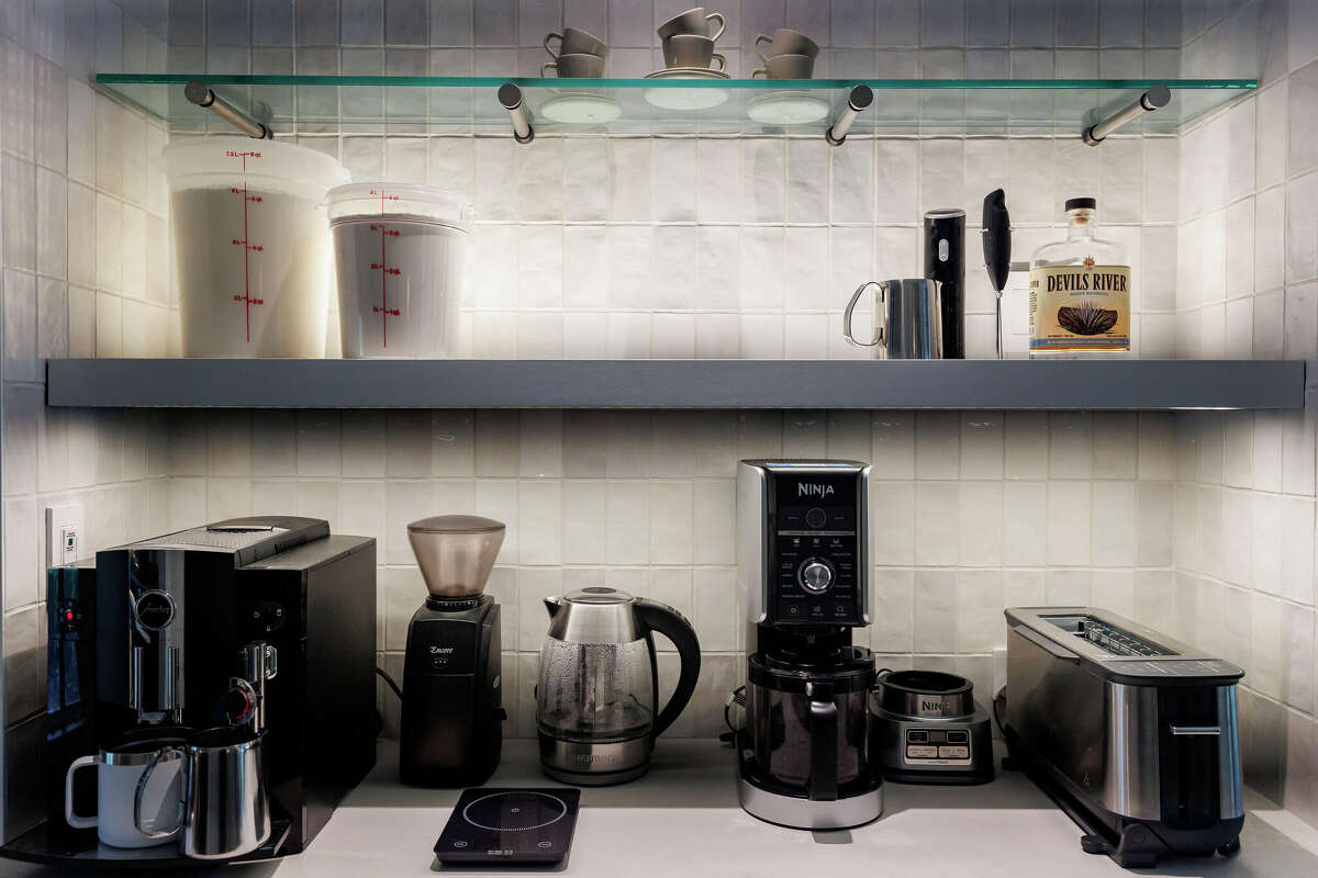 A built-in coffee bar offers extra storage space for drinks, appliances and bread-making supplies.