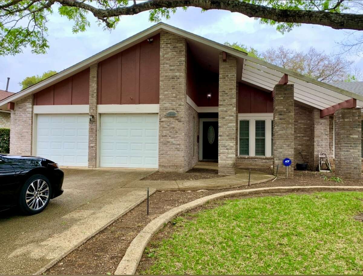 The outside of Michael Volk's Oak Meadow home is shown prior to the recently completed renovation.