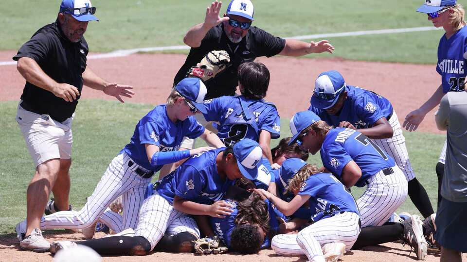 Needville's Texas East relief pitcher Donnie Jablonski is mobbed at the mound after throwing the final strike out against Louisiana at the Southwest Regional Little League championship game in Waco, Texas. Aug. 8, 2023. The 5-3 win earns them a trip to the world series in Pa. (Rod Aydelotte/Special)