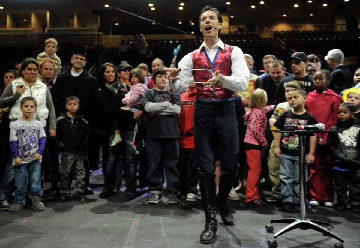Alex Ramon performs an escape trick during the All Access Pre-Show to the Ringling Brothers and Barnum and Baily circus at the Arena at Harbor Yard on Thursday, October 21, 2010.