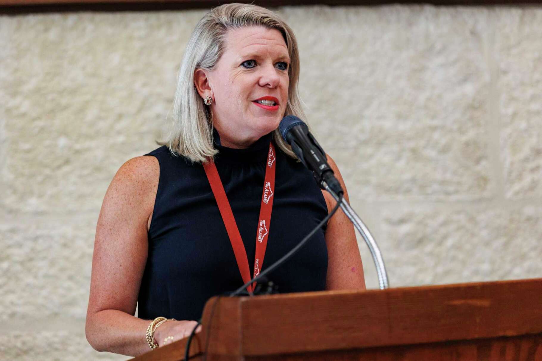 Alamo Trust Executive Director Kate Rogers welcomes visitors before unveiling the Alamo’s newest statue of Lt. Col. William B. Travis inside the Ralston Family Collections Center on Wednesday morning, Aug. 9, 2023.