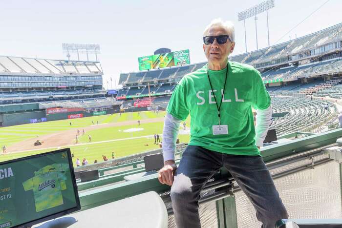 John Fisher cannot claim poverty with Oakland A's