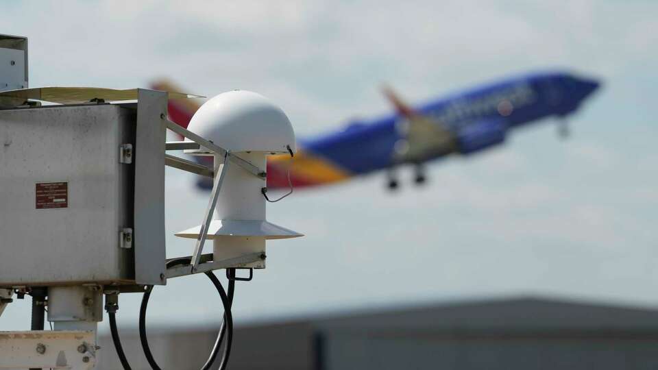 Temperature measuring equipment used by the National Weather Service that is part of the Automated Surface Observing System (ASOS) is shown at William P. Hobby Airport on Wednesday, Aug. 9, 2023, in Houston. The data is transmitted to the control tower and then to the National Weather Service.