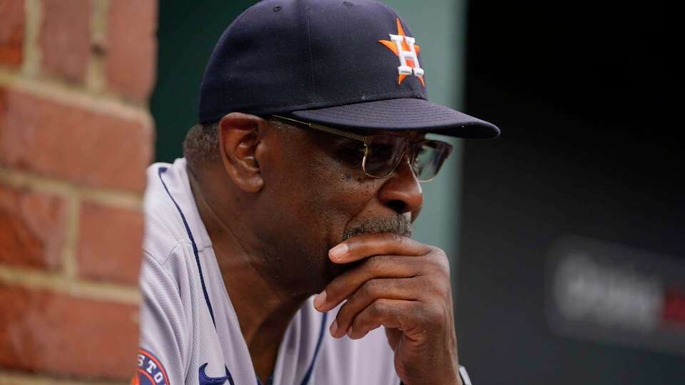 Houston Astros manager Dusty Baker Jr. looks on from the dugout in the third inning of a baseball game against the Baltimore Orioles, Thursday, Aug. 10, 2023, in Baltimore. (AP Photo/Julio Cortez)