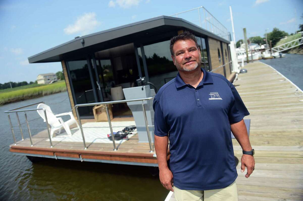 See houseboat living at Clinton Harborside Marina