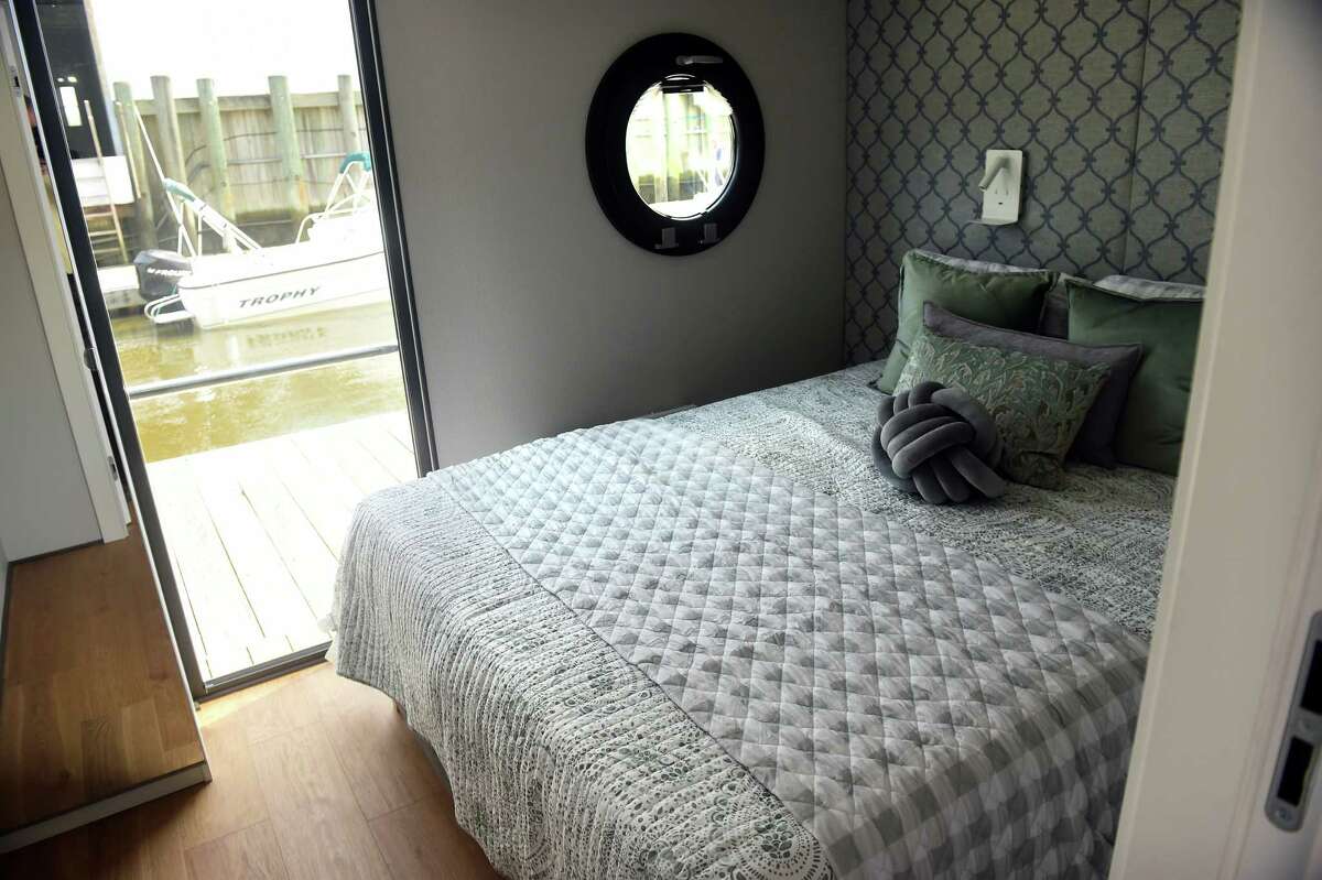 See houseboat living at Clinton Harborside Marina