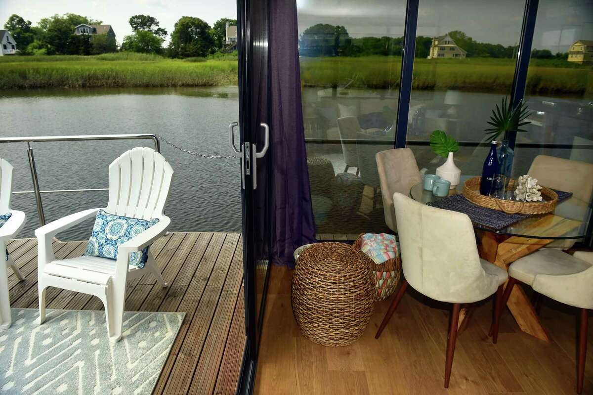 See houseboat living at Clinton Harborside Marina