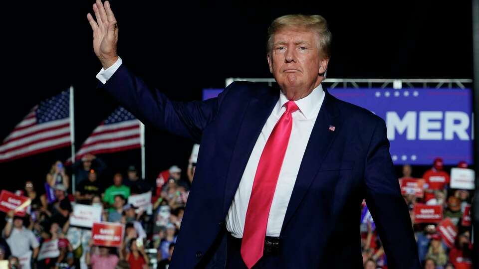 FILE - Former President Donald Trump arrives at a rally, Aug. 5, 2022, in Waukesha, Wis. A Wisconsin judge on Thursday, Aug. 10, 2023 allowed a civil lawsuit filed against 10 fake electors for former President Trump and two of his attorneys to proceed, rejecting a move to dismiss the case.