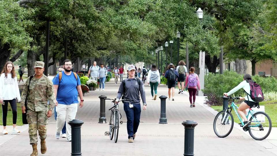 People are shown on the campus of Texas A&M University Tuesday, Nov. 1, 2022, in College Station.