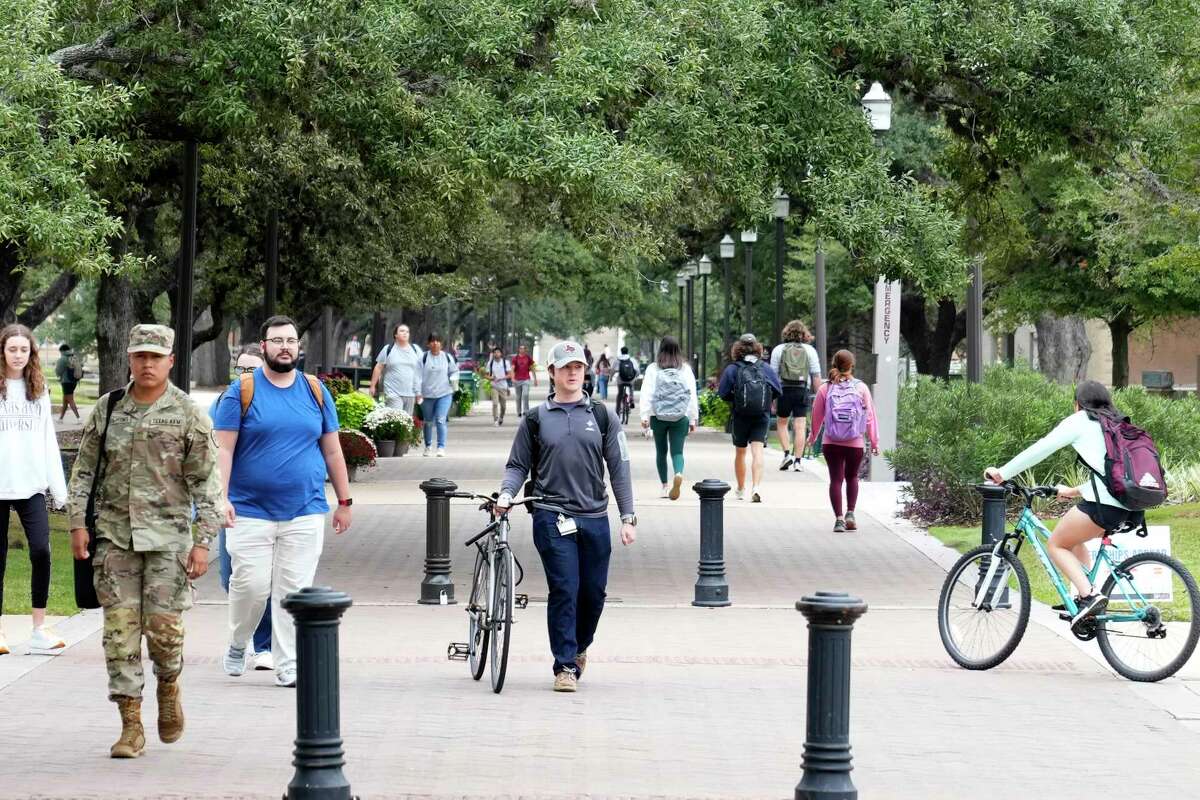 People are shown on the campus of Texas A&M University Tuesday, Nov. 1, 2022, in College Station.