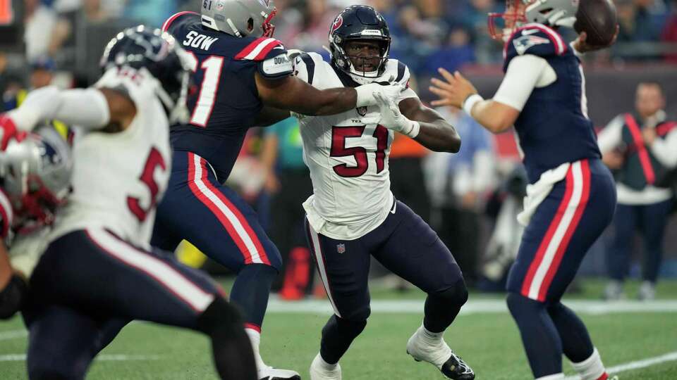 Houston Texans defensive end Will Anderson Jr. (51) pressures New England Patriots quarterback Bailey Zappe (4) during the first half of a NFL pre-season game at Gillette Stadium, Thursday, Aug. 10, 2023 in Foxborough, Mass.