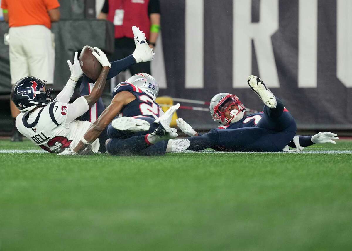 Houston Texans wide receiver Tank Dell makes his way to the field