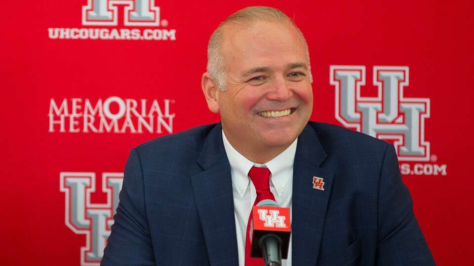 New University of Houston athletic director Chris Pezman listens to questions during an introductory press conference with board chairman Tilman Fertitta and university chancellor Renu Khator at TDECU Stadium, Tuesday, Dec. 12, 2017, in Houston. ( Mark Mulligan / Houston Chronicle )