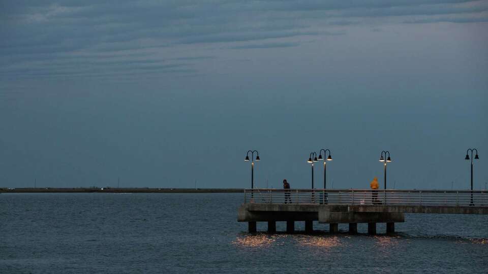 People fish at Walter Umphrey State Park on Sabine Lake Wednesday, March 23, 2022, in Port Arthur. 