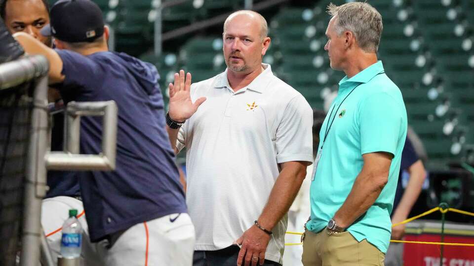 Former Houston Astros Billy Wagner chats with Craig Biggio during batting practice before the start of an MLB baseball game at Minute Maid Park on Friday, Aug. 11, 2023 in Houston .