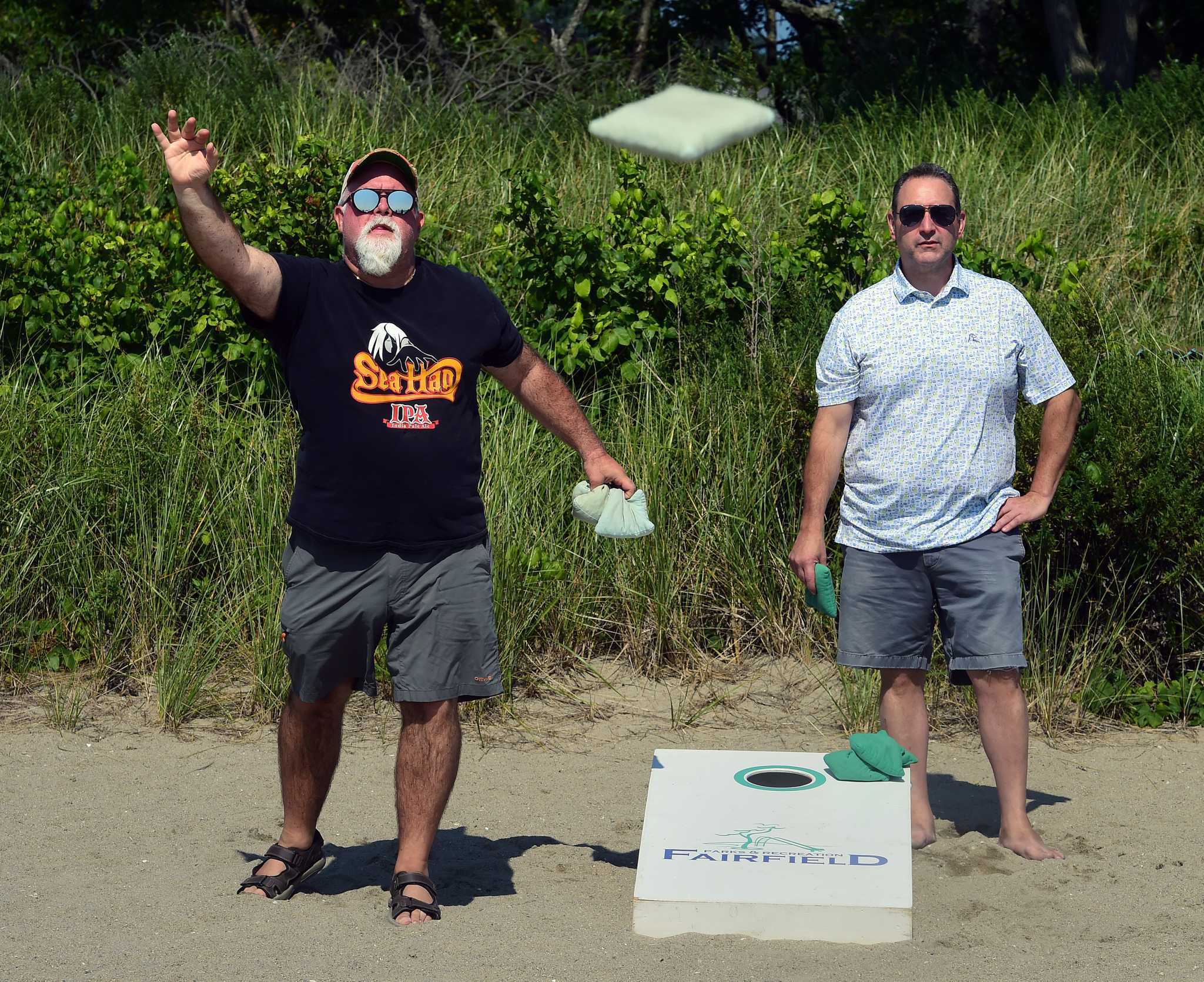 Photos from Celebrities Playing Cornhole - E! Online