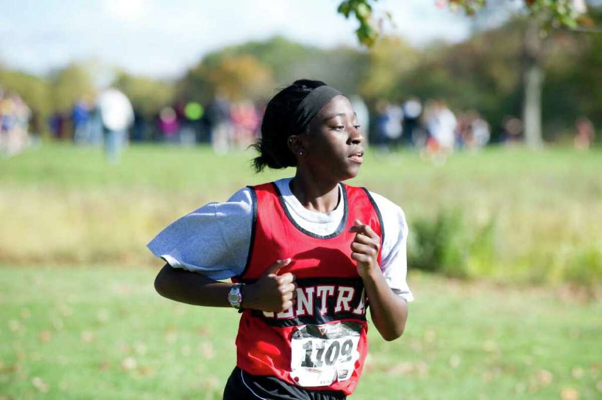 Bridgeport Central Akailia Chambers races in the FCIAC Cross Country Championships at Waveny Park in New Canaan Thursday, October 21, 2010.