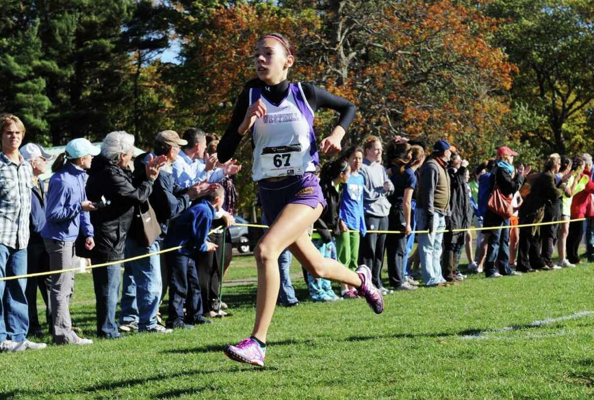 Westhill's Nicole Ambrosecchio finishes fourth in the FCIAC Cross Country Championships at Waveny Park in New Canaan Thursday, October 21, 2010.