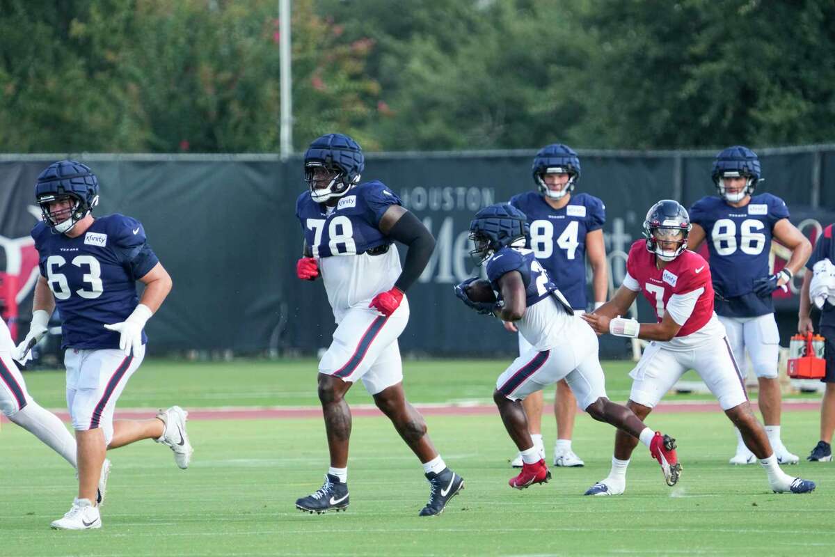 Houston Texans running back Mike Boone (22) carries the ball