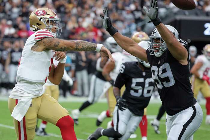 Quarterback Trey Lance of the San Francisco 49ers escapes a sack News  Photo - Getty Images