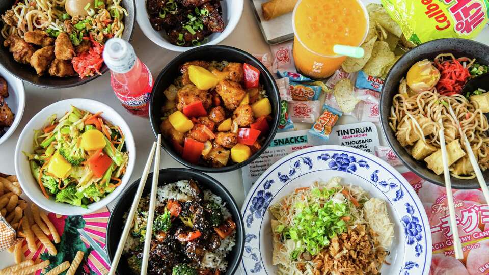 Assorted dishes at Tin Drum Asian Kitchen, a new pan-Asian restaurant at 1111 Shepherd just off the Washington Corridor.