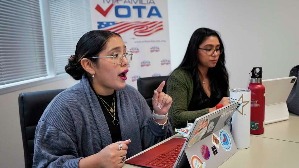 Jessaly Chavez, left, and Ariana Larios, of Denver Harbor Cares, speak during a meeting between members of DHC and Mi Familia Vota, while planning get out the vote efforts on Monday, Aug. 14, 2023 in Houston.