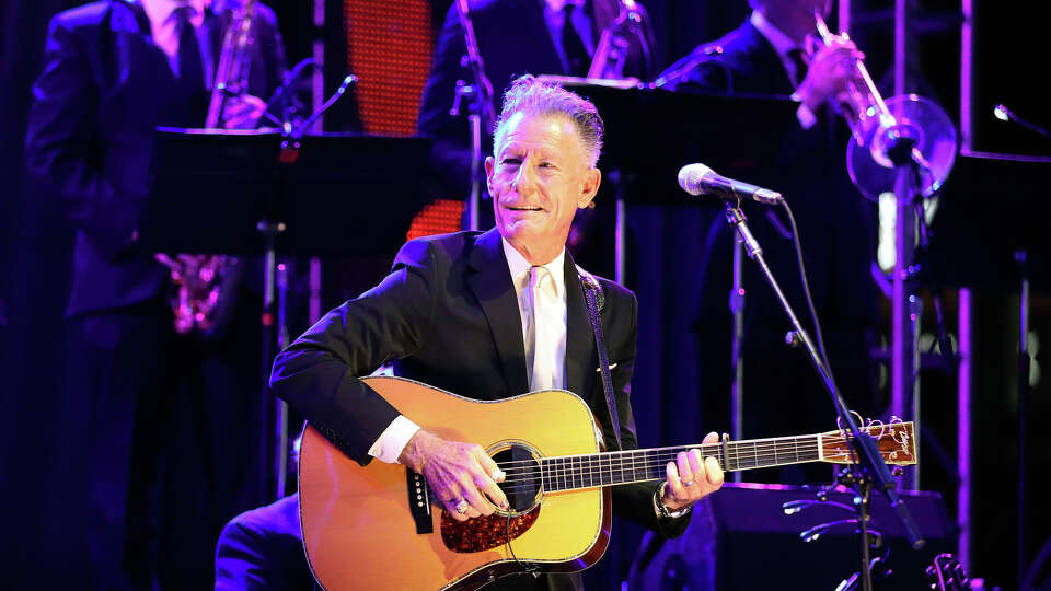 Singer-songwriter and Texas native Lyle Lovett and his Large Band performs during the Astros Foundation's sixth annual Diamond Dreams Gala presented by Chevron, on the field at Minute Maid Park, Thursday, September 9, 2021, in Houston.