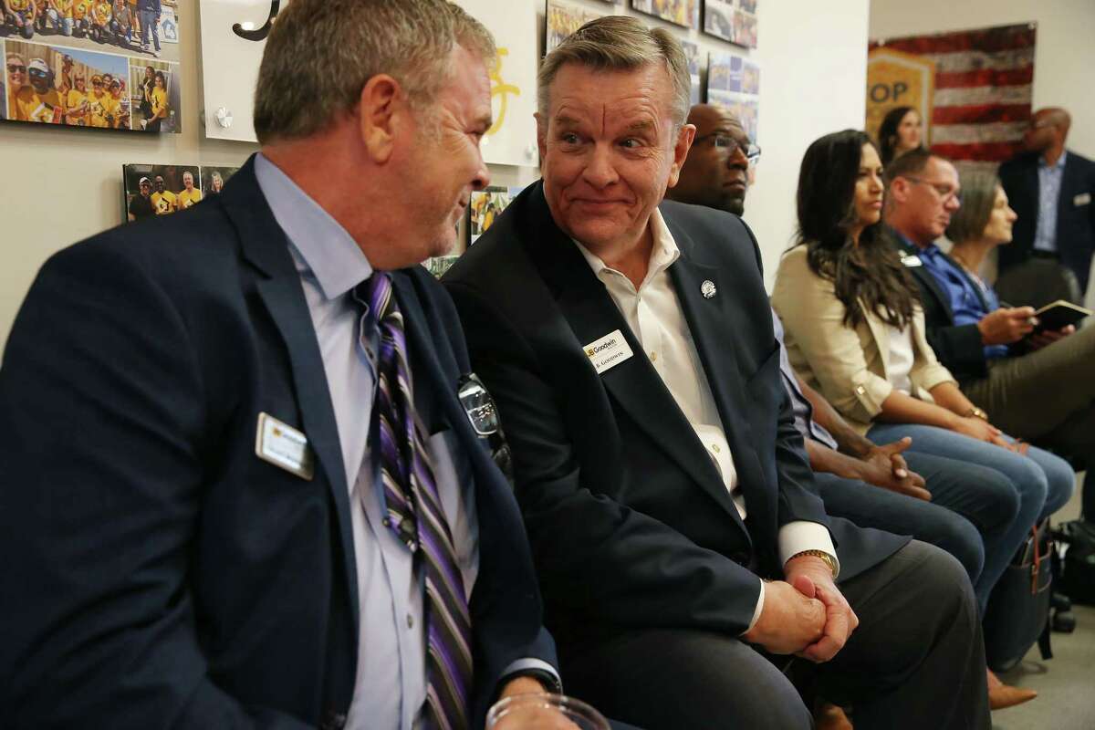 JB Goodwin Realtors CEO JB Goodwin, right, speaks with Growth and Performance Director Grant Bowman during a company meeting at the Sonterra Boulevard offices, Tuesday, Aug. 15, 2023.