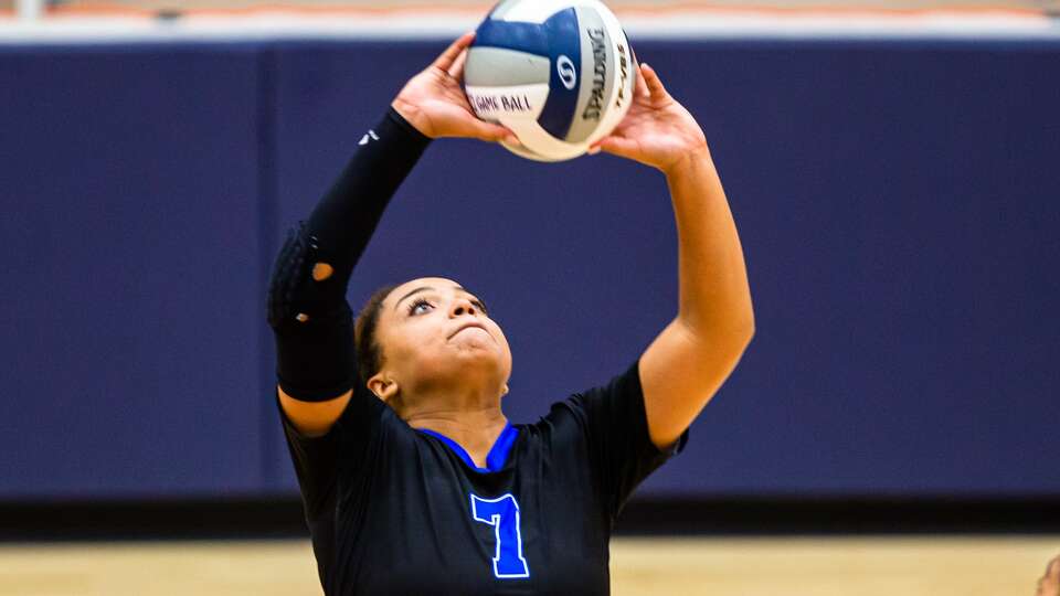 Clear Springs Morgan Durgens (7) sets the ball up during a high school volleyball game, Region III-6A area playoffs, Atascocita vs. Clear Springs at Phillips Gym in Pasadena, TX, Friday, November 4, 2022. Clear Springs defeated Atascocita 3-0.