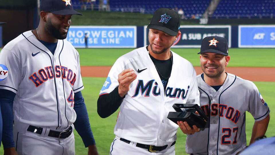 MIAMI, FLORIDA - AUGUST 15: Yuli Gurriel #10 of the Miami Marlins receives his World Series ring from the Houston Astros prior to a game at loanDepot park on August 15, 2023 in Miami, Florida.