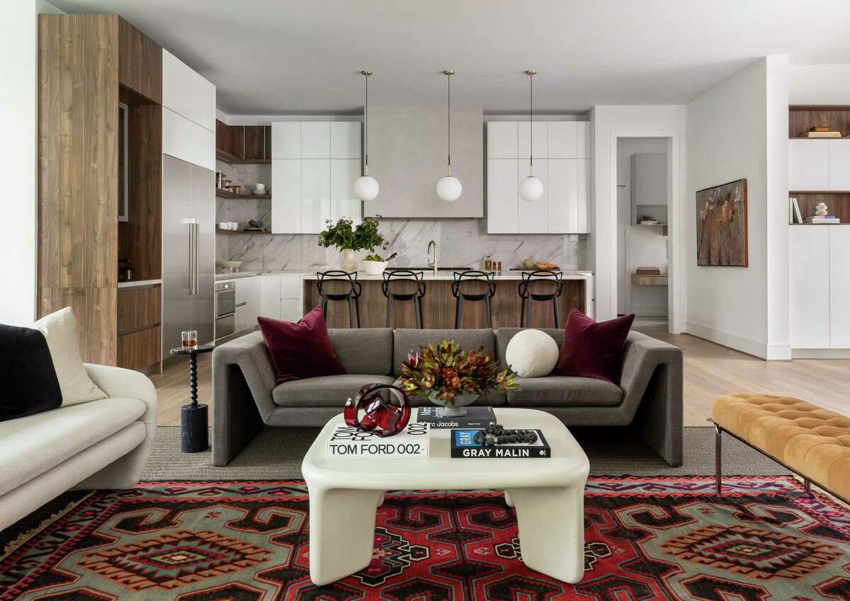 A rug gifted by Alejandra Rincon's father creates the color palette for the living room.