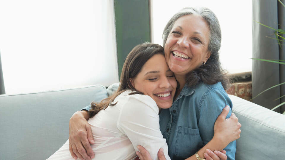 Latino mother with adult daughter